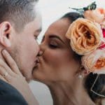 Bride kissing groom