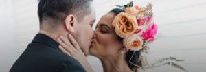 Bride kissing groom