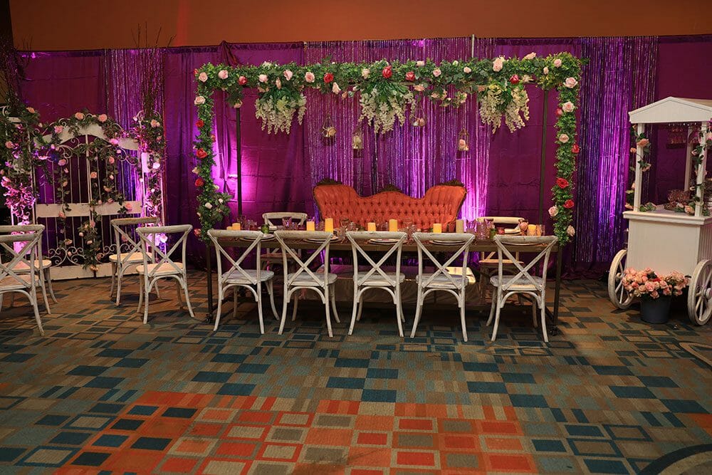 Table decor with purple drapes