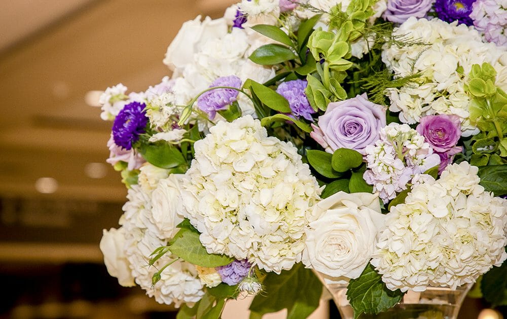 Bouquet-White flowers with purple roses