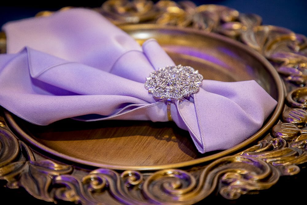 Gold place setting-lavendar linenand jeweled napkin ring
